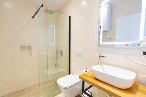 Kylpyhuone majoituspaikassa Corallo Rooms
