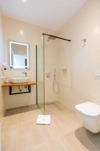 Ett badrum på Corallo Rooms