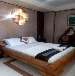 Postel nebo postele na pokoji v ubytování The Reinhold Guesthouse Bali + 37 fotografií