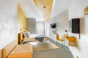 Телевизор и/или развлекательный центр в Carrick Hotel Camogli Portofino Coast