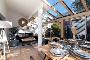 Posedenie v ubytovaní Guilhermy - Maison contemporaine avec jardin