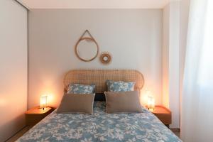 Posteľ alebo postele v izbe v ubytovaní Guilhermy - Maison contemporaine avec jardin