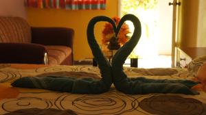 Postel nebo postele na pokoji v ubytování Hotel Posada Tolteca
