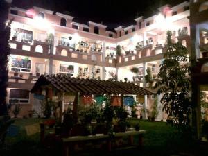Κήπος έξω από το Hotel Posada Tolteca