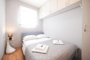 Posteľ alebo postele v izbe v ubytovaní Villa Todi