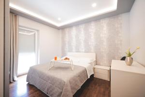 Posteľ alebo postele v izbe v ubytovaní Villa Todi