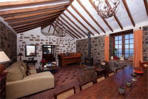 A seating area at Historic Canarian House, Private Heated Infinity Pool, BBQ, WIFI + Panoramic Ocean Views