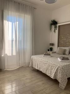 Postel nebo postele na pokoji v ubytování Prima Stella Tourist Rooms