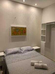 Tempat tidur dalam kamar di Condomínio tranquilo
