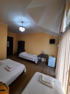 Letto o letti in una camera di Delta Hotel
