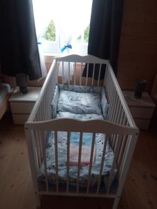 Postel nebo postele na pokoji v ubytování A&M Apartamenty