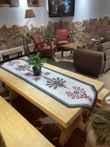 Posedenie v ubytovaní Prestige Apartament z sauna Zbojnicka Piwnica Krupowki + 3 fotografie