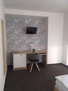 TV a/nebo společenská místnost v ubytování Hotel Trim