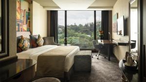 Ένα ή περισσότερα κρεβάτια σε δωμάτιο στο Sarova Panafric Hotel
