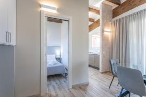 Ένα ή περισσότερα κρεβάτια σε δωμάτιο στο Green House in Villa con Piscina +29 φωτογραφίες