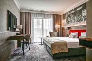 Łóżko lub łóżka w pokoju w obiekcie Sopotorium Hotel & Medical Spa