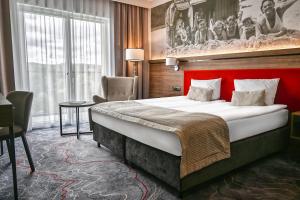 Łóżko lub łóżka w pokoju w obiekcie Sopotorium Hotel & Medical Spa