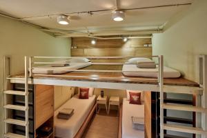 A bed or beds in a room at 安蘭居旅店 An Lan Jie Hotel