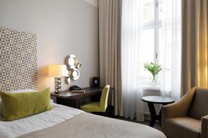 Letto o letti in una camera di Elite Grand Hotel Gävle
