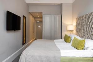 Letto o letti in una camera di Elite Grand Hotel Gävle