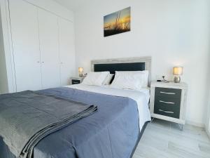 A bed or beds in a room at Villa Tranquilidad