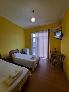 Letto o letti in una camera di Delta Hotel