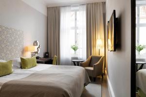 Letto o letti in una camera di Elite Grand Hotel Gävle