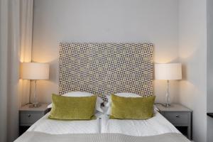 Letto o letti in una camera di Elite Grand Hotel Gävle