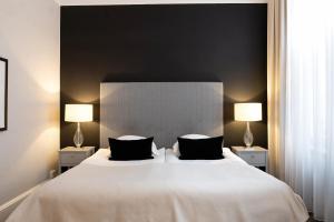 Letto o letti in una camera di Elite Grand Hotel Gävle