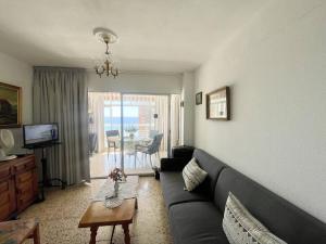 Telewizja i/lub zestaw kina domowego w obiekcie Eleven Caballos Apartment