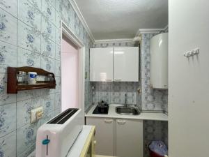 Kuchnia lub aneks kuchenny w obiekcie Eleven Caballos Apartment