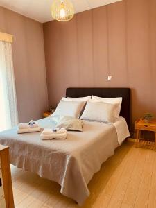 Posteľ alebo postele v izbe v ubytovaní Myrtia Home