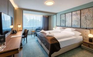 Posteľ alebo postele v izbe v ubytovaní Hunguest Hotel Bál Resort