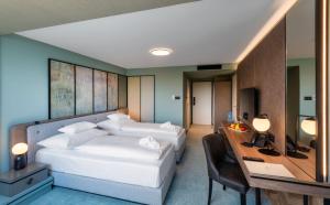 Posteľ alebo postele v izbe v ubytovaní Hunguest Hotel Bál Resort