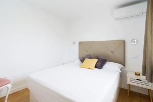 Postel nebo postele na pokoji v ubytování Las Burrras Buigues Beach + 21 fotografií