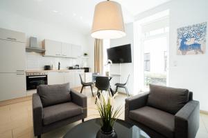 A kitchen or kitchenette at Modern and lovely apartment next to subway station