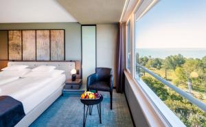 Posteľ alebo postele v izbe v ubytovaní Hunguest Hotel Bál Resort
