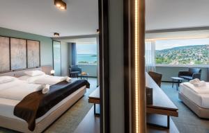 Posteľ alebo postele v izbe v ubytovaní Hunguest Hotel Bál Resort