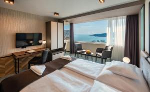 Posteľ alebo postele v izbe v ubytovaní Hunguest Hotel Bál Resort