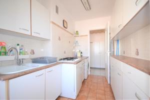 Kuchyň nebo kuchyňský kout v ubytování Family appartment