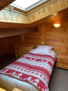 Cama o camas de una habitación en Hôtel Les Glaciers