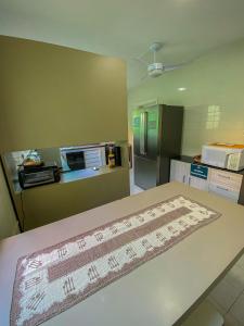 Vila Itanhaém客房内的一张或多张床位