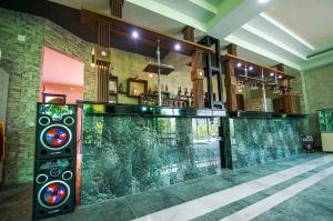 a large aquarium in the middle of a room at Delta Hotel in Ureki