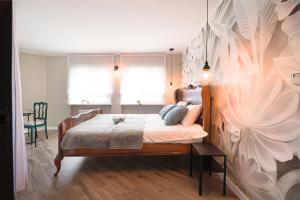 Posteľ alebo postele v izbe v ubytovaní Loft przy Bulwarach + 5 fotografií