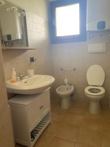 A bathroom at Residence La Conia