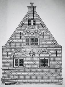 a tall brick building with three windows on it at Wohnen im Denkmal/Eckbäckerhaus beste Altstadlage in Friedrichstadt