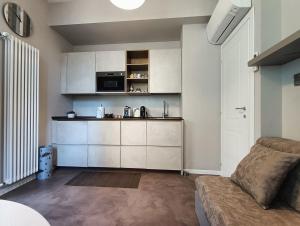 A kitchen or kitchenette at Residenza Porta Romana