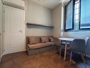 A seating area at Residenza Porta Romana