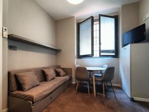 A seating area at Residenza Porta Romana