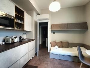 A kitchen or kitchenette at Residenza Porta Romana